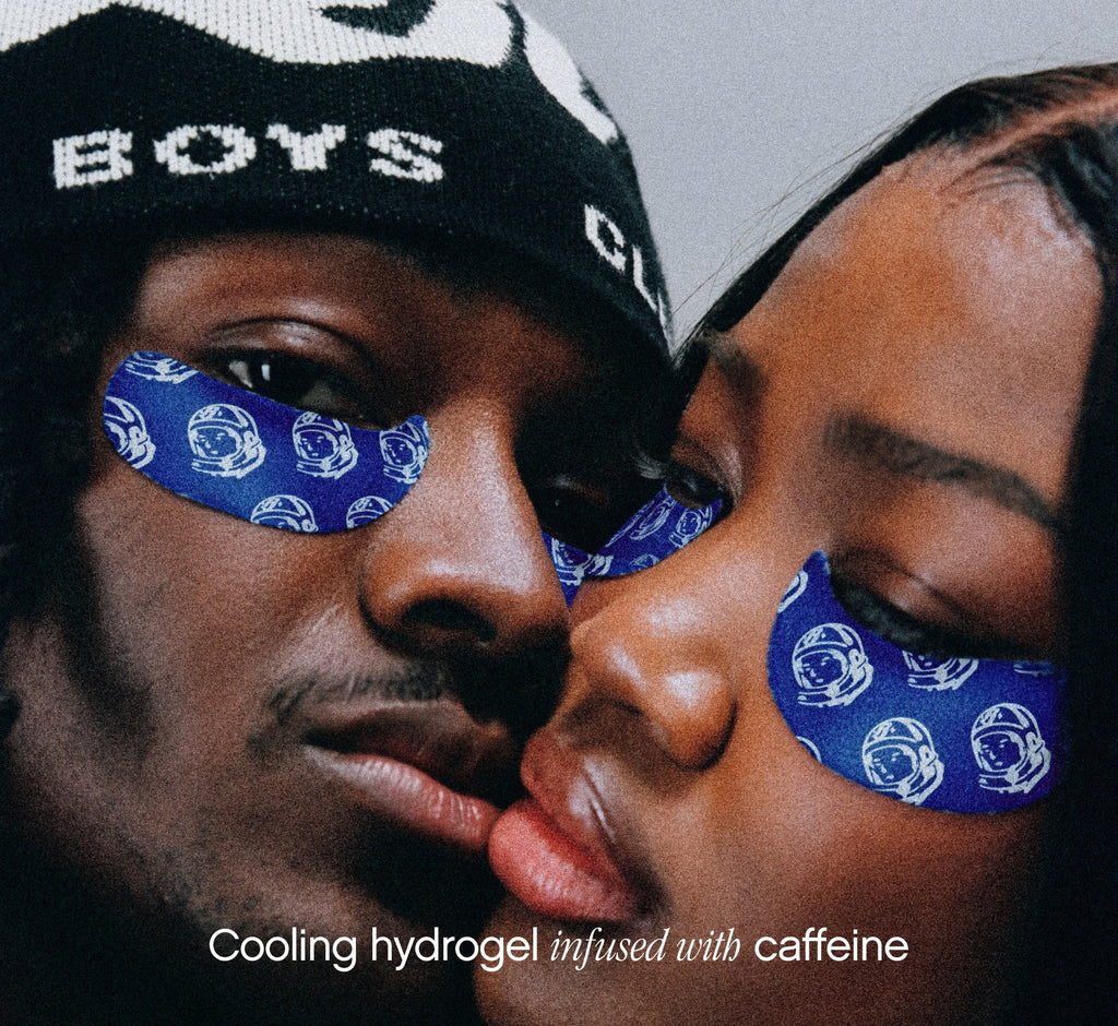 Eye patches for puffiness from Topicals worn by two models pressing their faces together, with text highlighting the cooling caffeine-infused hydrogel formula.